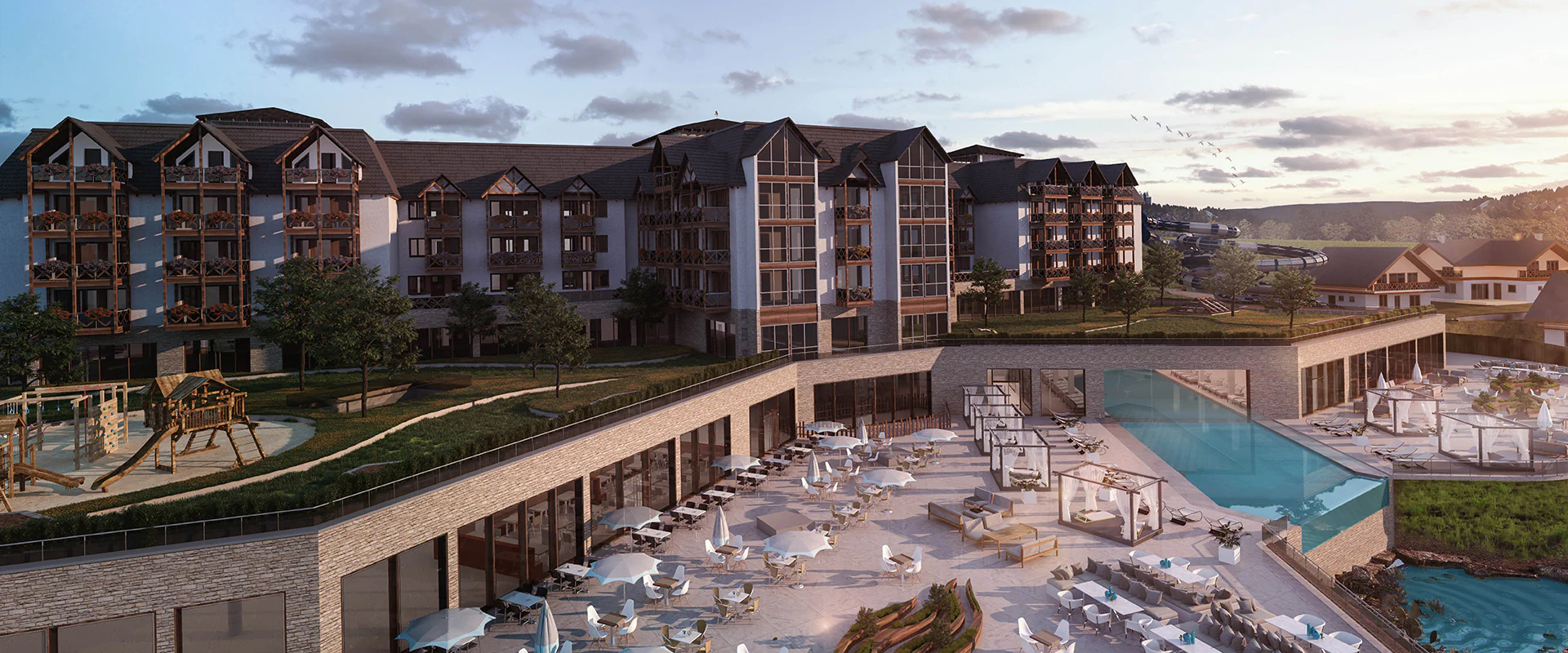 Bildbeschreibung / description: Bio-Seehotel in Zeulenroda, angrenzend an einen glitzernden See in einer schönen Naturlandschaft.